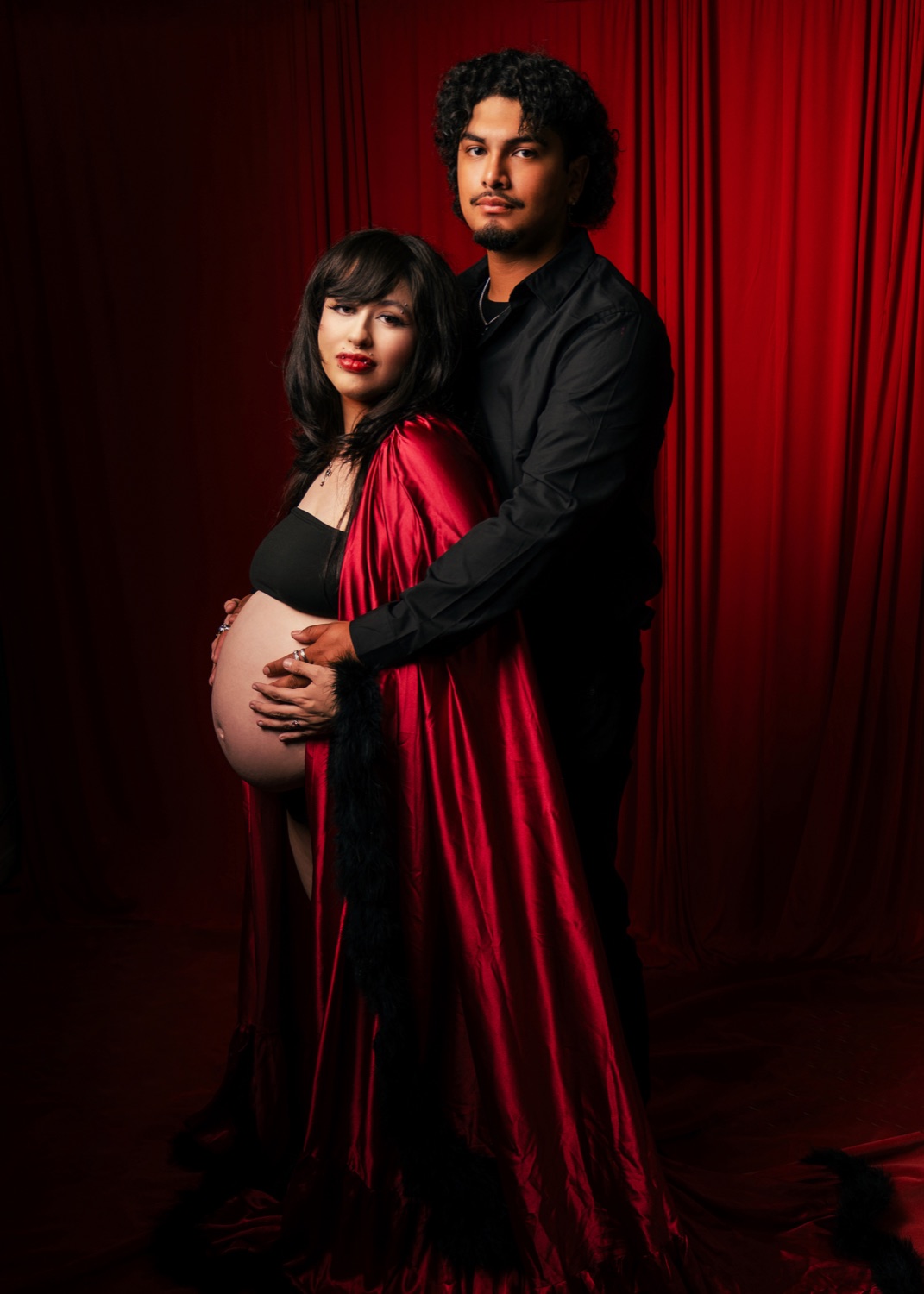 Dramatic couples maternity portrait on a red drape — Look Gross Studio, Signal Hill