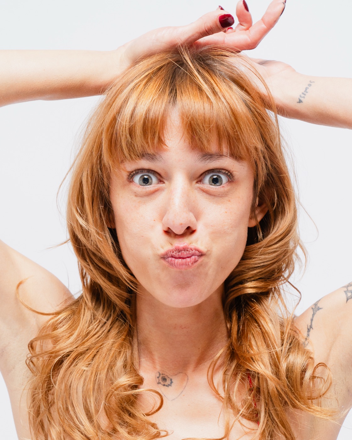 Expressive, personality-forward actor headshot on a white backdrop — Look Gross Studio, Signal Hill