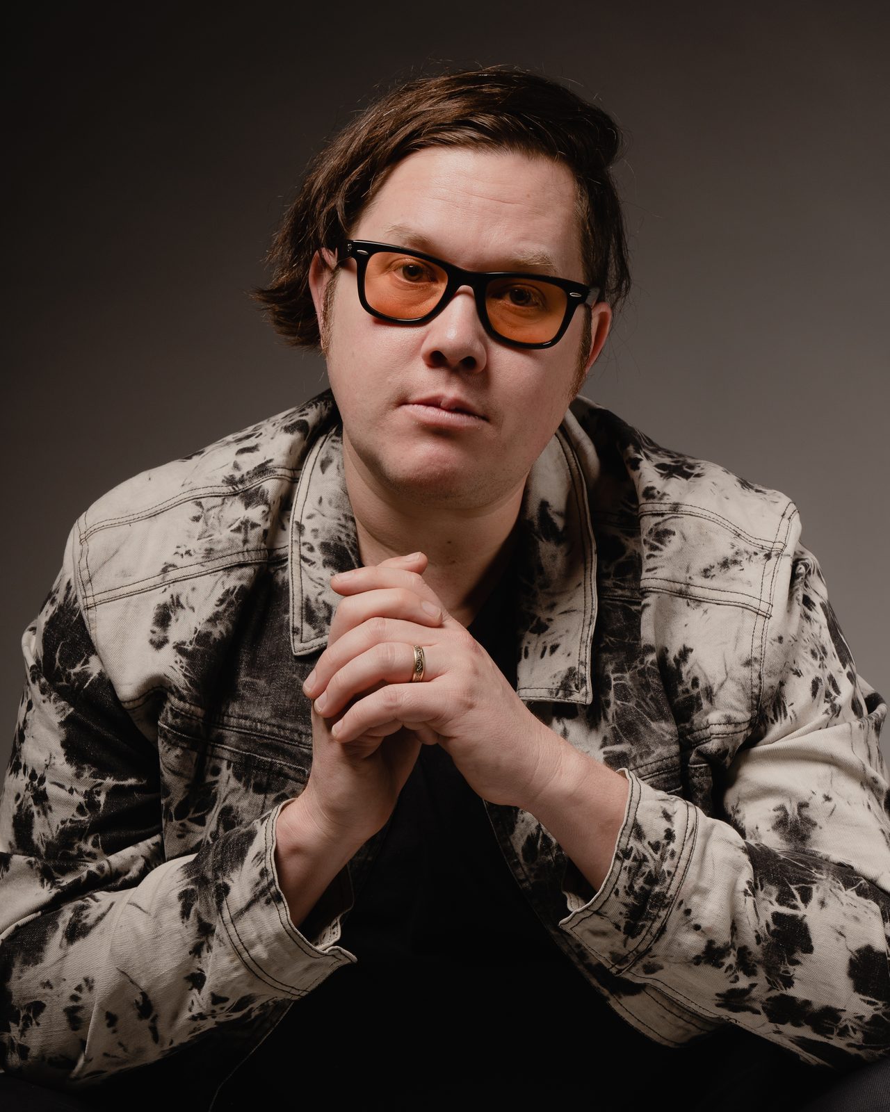 Red-lit editorial portrait — Look Gross Studio