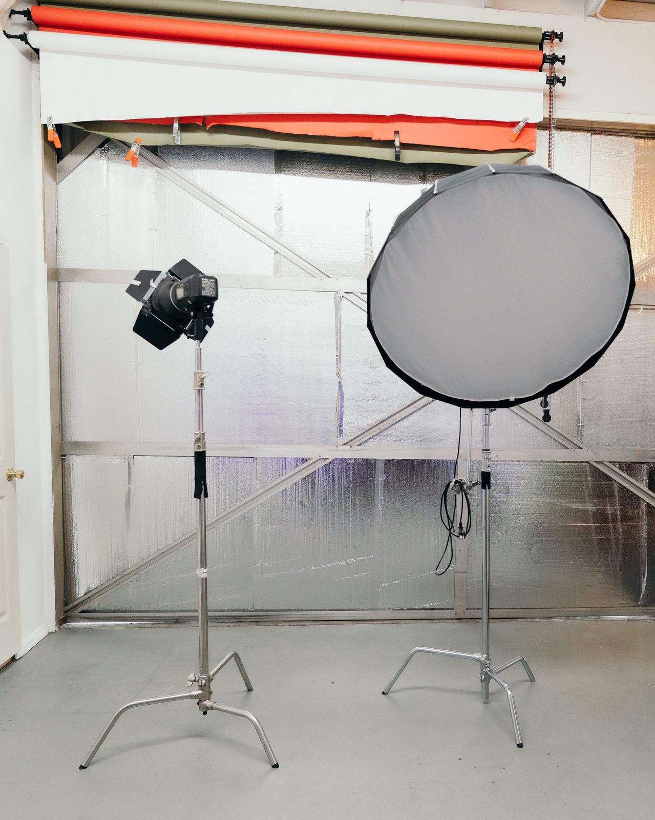 Professional lighting and backdrop setup in the shooting area